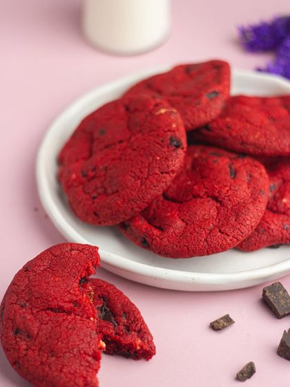 My vibrant red velvet cookies are a feast for the eyes and the palate. They have a subtle cocoa flavor and are studded with chocolate chips.
