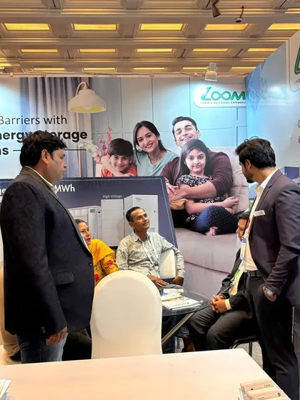 In-depth discussions happening at our booth during the Mercom Summit. We believe in understanding our customers' needs to provide the best possible energy solutions.