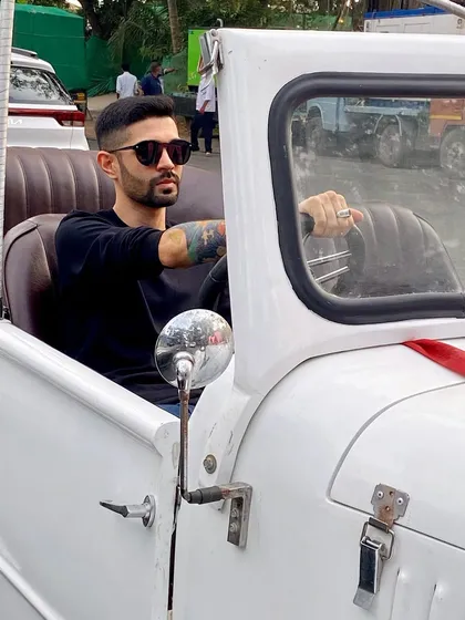 Arriving in style to get the baraat started. Whether it's a vintage car or a custom DJ truck, I make sure the procession is an event in itself.