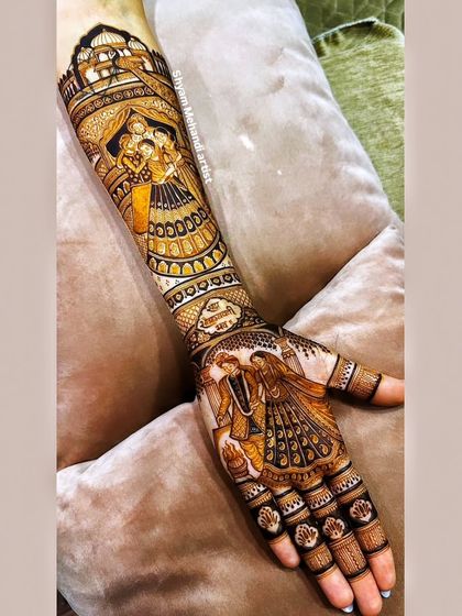 A full-arm design that combines a couple's portrait on the palm with a family portrait on the forearm.