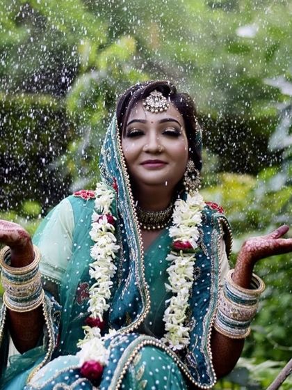 This creative shot in the rain shows that my makeup is built to last. I use professional, long wearing products to ensure you look flawless through tears, sweat, and even a bit of water.
