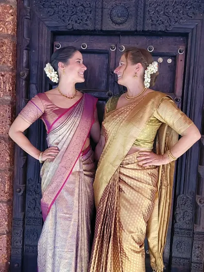 Candid and happy, this mother-daughter duo fully embraced the Indian wedding experience. I ensured their drapes were comfortable for the entire event.