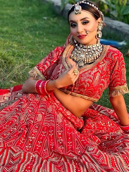 A classic red lehenga look. This is the bread and butter of bridal makeup, and we perfect it in my course.
