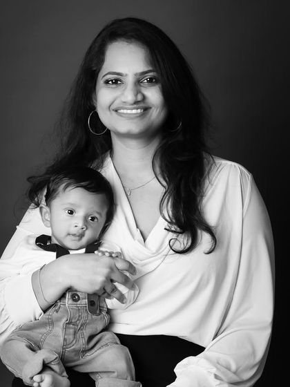 It's so important to get pictures with all the cousins together! This black and white portrait captures a beautiful family moment between an aunt and her sweet nephews.
