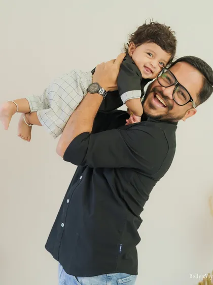The bond between a father and his son is so special. This shot captures the pure, uninhibited laughter and energy of their connection, a memory of pure happiness.