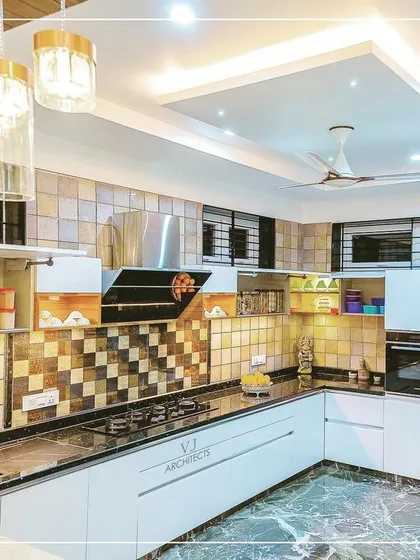 A duplicate view of the modern L-shaped kitchen, showing the ample storage and counter space.