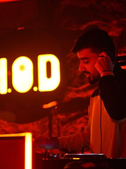 Focused on the mix at H.O.D Club in Koramangala. The red lighting and intense atmosphere of the club make for a powerful, immersive experience.
