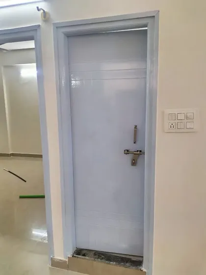 I provide solid colour wood painting for a fresh look. This door and its frame have been given a smooth, durable finish in a calming light blue shade.
