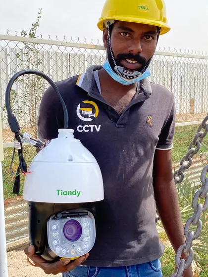 On-site in Abdally, holding a Tiandy 5MP PTZ camera before installation. I handle all types of advanced cameras to give you features like remote pan, tilt, and zoom for active monitoring of large areas.