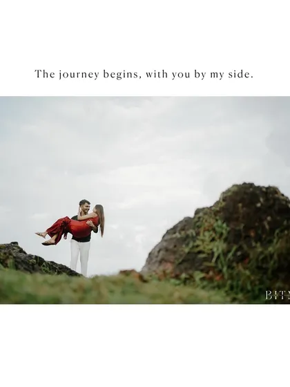 A classic romantic pose, with the groom carrying the bride against a backdrop of Goan cliffs and greenery. This shot is all about celebrating their love in a grand, cinematic way.