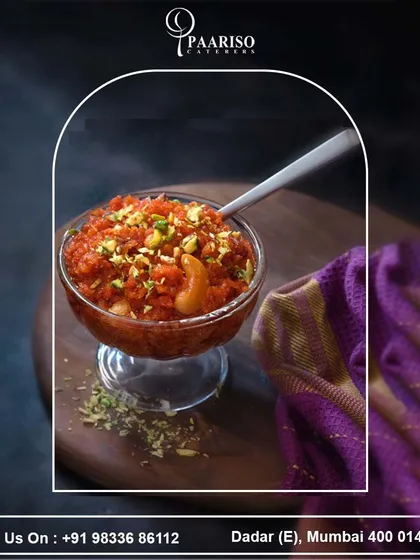 A beautifully presented bowl of our Gajar ka Halwa, garnished with cashews and pistachios. We take pride in creating traditional desserts that are made with love and bring a sense of warmth to any celebration.