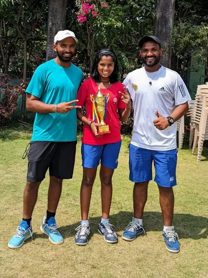 Tamanna Nair with her coaches after winning the U-14 All India Championship Series Singles title in Navi Mumbai.