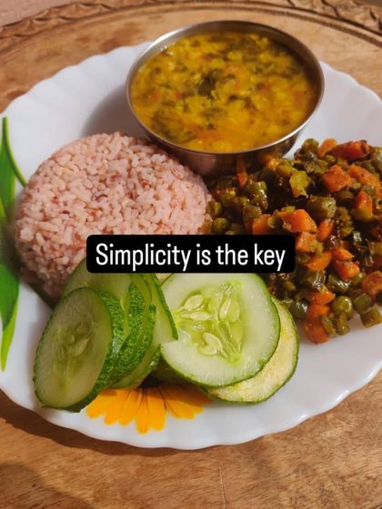 Simplicity is the key. My nani is 80 and thriving on simple, home-cooked meals. This plate of red rice, dal, and sabzi is a testament to the power of traditional, uncomplicated eating.