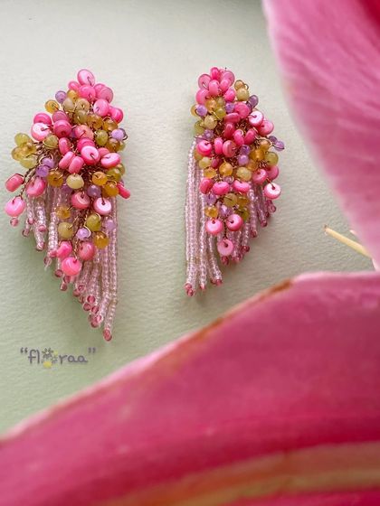Like a mini bouquet for your ears, these colourful mop earrings are designed with a perfect balance of pink and yellow hues.