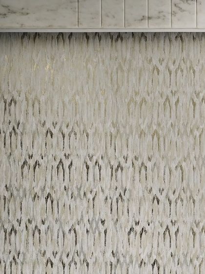 A full view of the textured wallpaper used in the bedroom. Its subtle, brushstroke-like pattern adds depth and a touch of artistic flair to the wall, complementing the room's neutral and earthy color scheme.