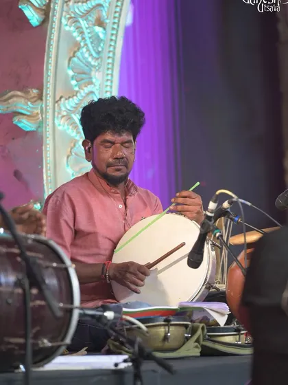 The powerful beat of the thammate, a traditional drum, adding its distinct voice to our concert.