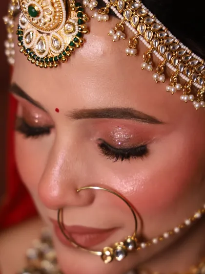 A close-up of the eye makeup for our Rajwada bride. The glitter is applied carefully for a sophisticated sparkle that catches the light beautifully.