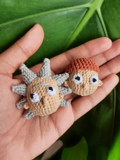 Here are the Rick and Morty heads side-by-side. They make a perfect matching set for fans of the show, available as keychains or pins.