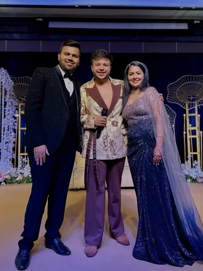 A photo with the happy couple whose wedding I had the pleasure of hosting and choreographing. Their glowing review is the ultimate reward.