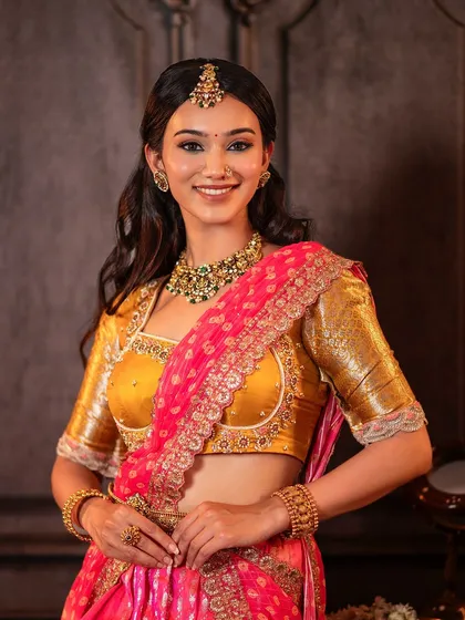 A serene and elegant look for this model, showcasing one of my classic half saree designs. The mustard yellow Kanchi blouse is paired with a pink brocade skirt and an embroidered dupatta.