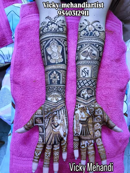 A beautiful example of a full coverage design featuring a Varmala ceremony on the palms, with a Ganesha portrait and couple's initials on the arms.