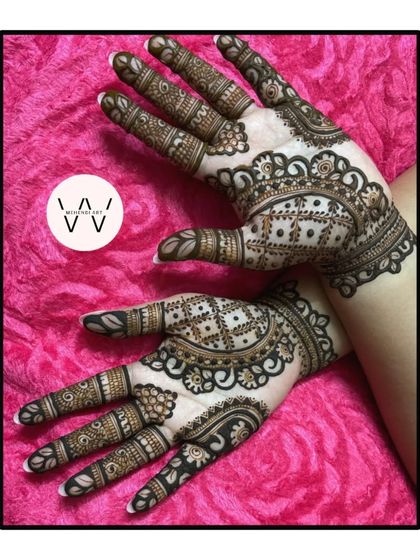 A lovely design for a wedding guest, with a mix of patterns and styles.