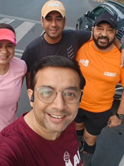 A cheerful selfie capturing the energy of our weekend running group. It's the perfect way to de-stress and socialize.