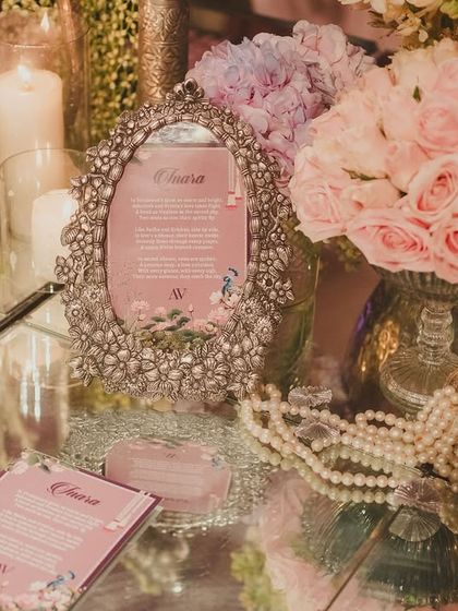 Every detail, down to the stationery and table decor with pearls and roses, was designed to reflect the opulence and romance of the wedding theme.