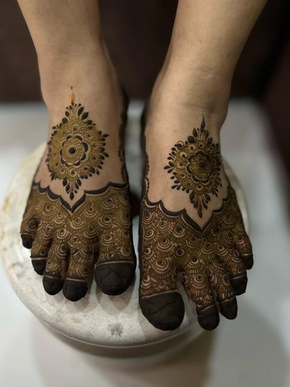 A top-down view of the mandala foot mehendi, highlighting its perfect symmetry.