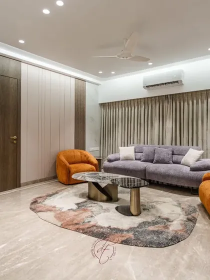 Here, the integrated, self-illuminated display niche is visible, providing an elegant space for artifacts. This view shows how we balance bold furniture choices with sophisticated, built-in architectural details.