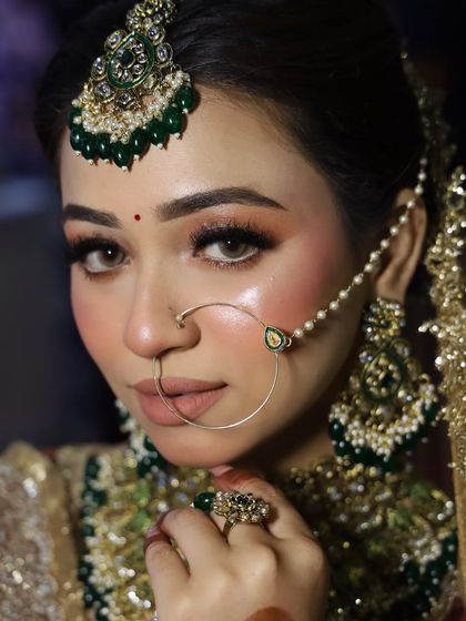 A portrait of our model from the beauty expo. The makeup is flawless, with a strong highlight and a nude lip to balance the dramatic eyes.