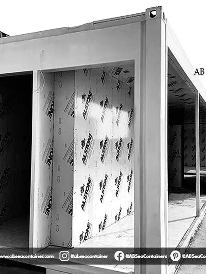 A customized container home in the process of being built. This view shows the structural modifications and interior paneling, highlighting our A-to-Z customization capabilities.