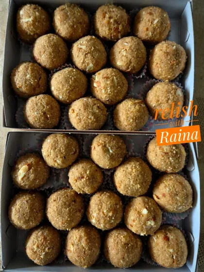 Two boxes of Choorma Laddoos, a traditional sweet from Rajasthan and Gujarat. They are rich, flavorful, and deeply satisfying.