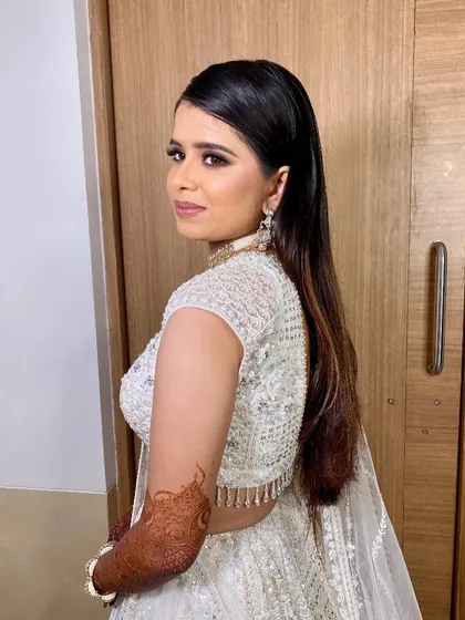 A sassy and confident pose from Twinkle. Her makeup is on point, with a perfectly blended smokey eye and a flawless matte base.