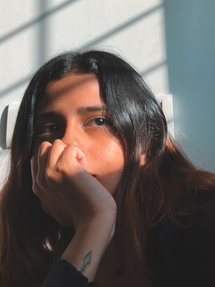 A close-up, introspective portrait.