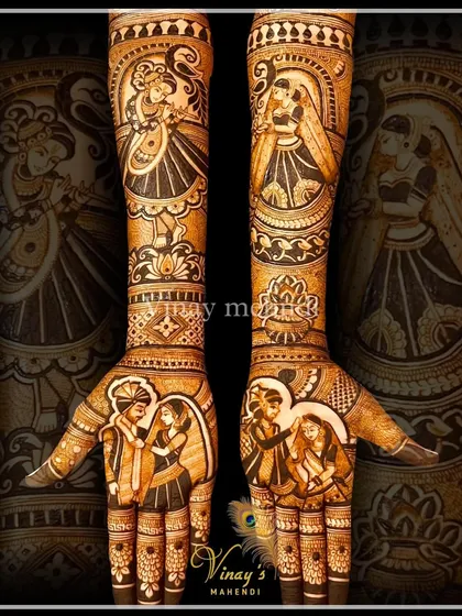 A beautiful Radha Krishna themed bridal mehndi, combining divine figures with traditional wedding scenes. This is a perfect example of the thematic and storytelling-based art that we focus on in our professional courses.