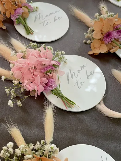 How pretty are these name tags for a baby shower? I engraved acrylic tags and attached a small bouquet of fresh and dried flowers. They were such a hit.