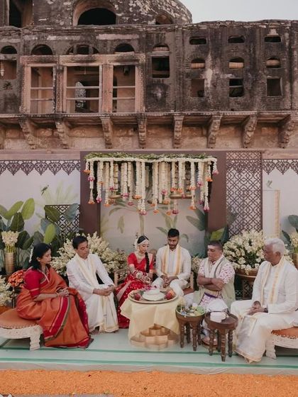 We began the wedding festivities with a Ganesh Puja to seek blessings. The decor embraced the groom's Tamil heritage with traditional South Indian elements like brass lamps and fragrant flowers.