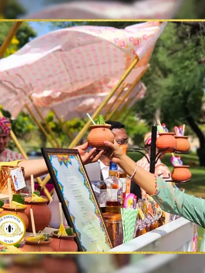 A guest enjoying a refreshing drink from our traditional kulhad bar. We love creating these authentic experiences that blend great taste with cultural charm.