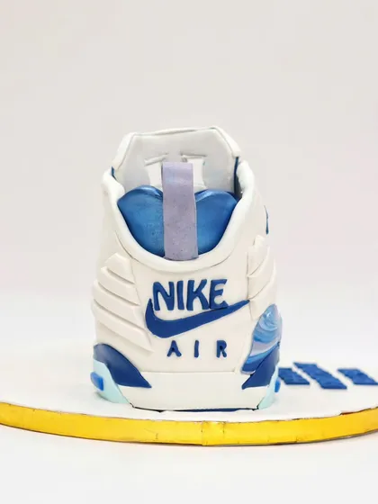 Another angle of the back of the Nike sneaker cake, highlighting the sculpted details.