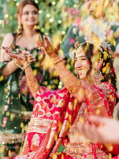 The pure, unscripted joy of a Mehendi ceremony. I love capturing these moments of 'desi masti', full of laughter, color, and energy that make Indian weddings so special.
