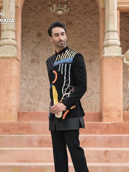 A three-quarter view of the abstract art bandhgala, capturing the dynamic and artistic nature of the embroidery.