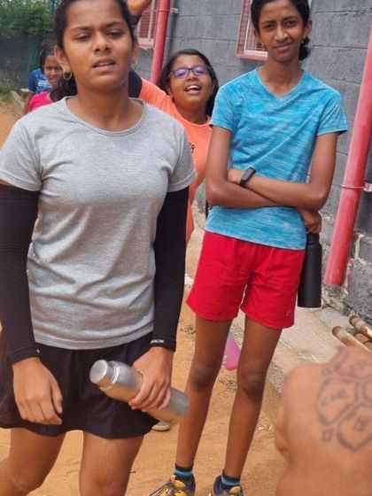 Young athletes taking a break during a tough training session. Hard work requires proper rest and recovery, even for kids.