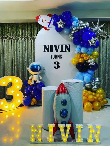 The full Space theme home setup, including a light-up number '3' and personalized marquee letters.