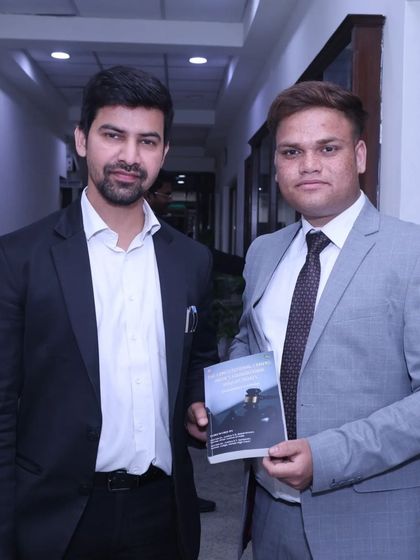 With the young author of a new book on Constitutional Law. I am always keen to support and encourage emerging legal talent.