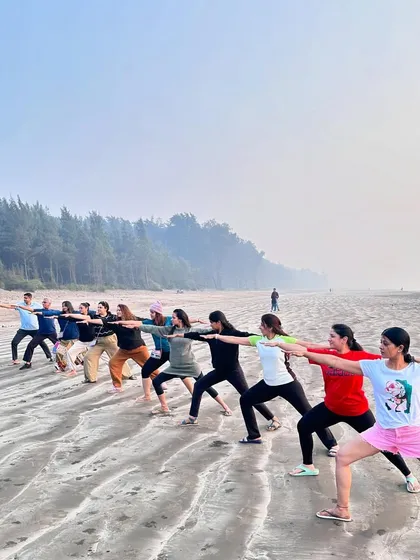 A beautiful moment from our yoga retreat, practicing Virabhadrasana II (Warrior II) on the beach. Practicing in nature adds a whole new dimension of peace and connection.