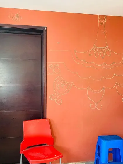 The very first sketch on the wall for the 'Ethnic Ether Mural.' It all begins with a simple line drawing in gold, mapping out the vision before the color comes in.