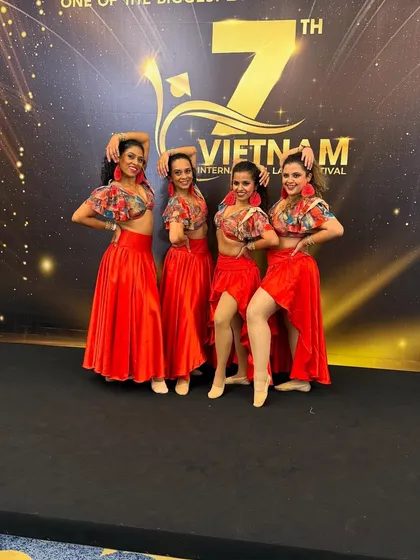Our all girls team in their stunning red costumes, ready to take the stage at the Vietnam International Latin Festival. They look as fierce as they dance.