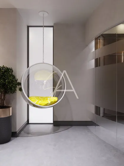 To inject a sense of playfulness and relaxation into a modern workspace, we added this hanging bubble chair. It serves as a unique breakout spot for informal discussions or a moment of creative thinking, breaking the monotony of a typical office.