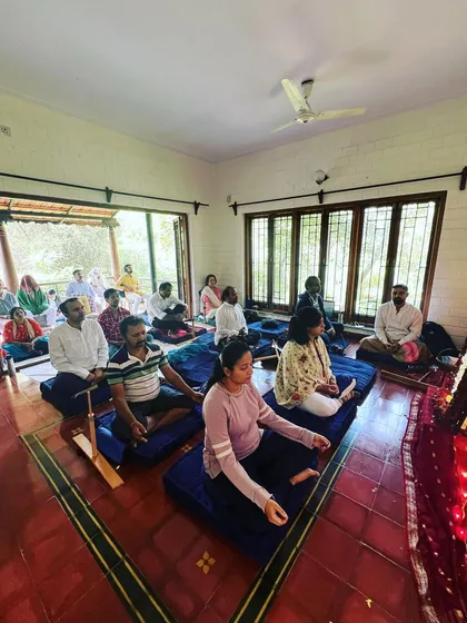 A view of our Christmas meditation retreat, where devotees gathered to dive deep into their practice. The open doors welcome the serenity of nature, blending the inner and outer worlds into a single, peaceful experience of stillness and community.
